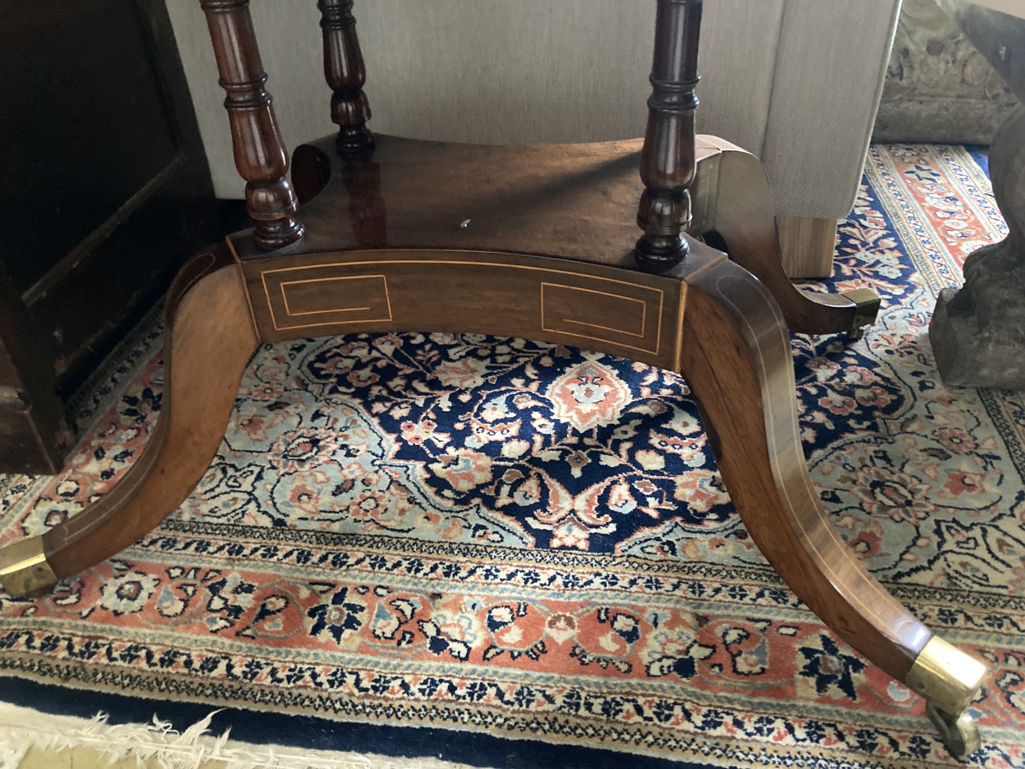 A Regency mahogany sofa table banded in coromandel, W. 3ft. D. 2ft. 2in. H. 2ft 4in.